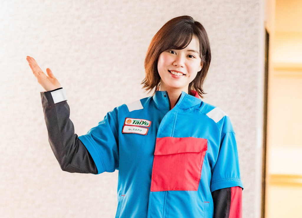 紹介する女性